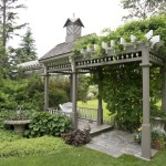 Our stunning outdoor setting is surrounded by lavish perennial gardens, gorgeous stone statuary and a shady pergola.